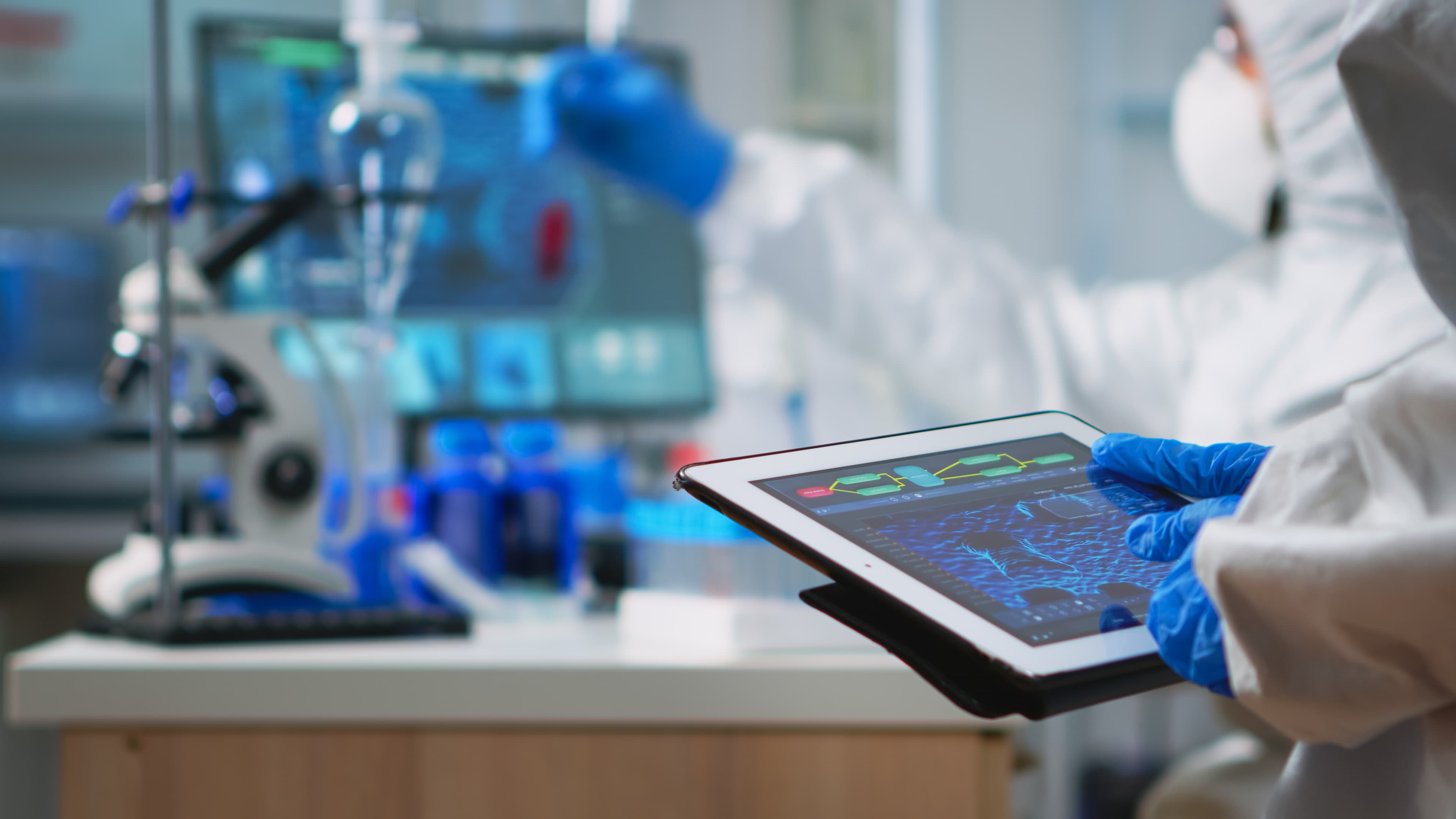 Technician reviewing run data on a tablet