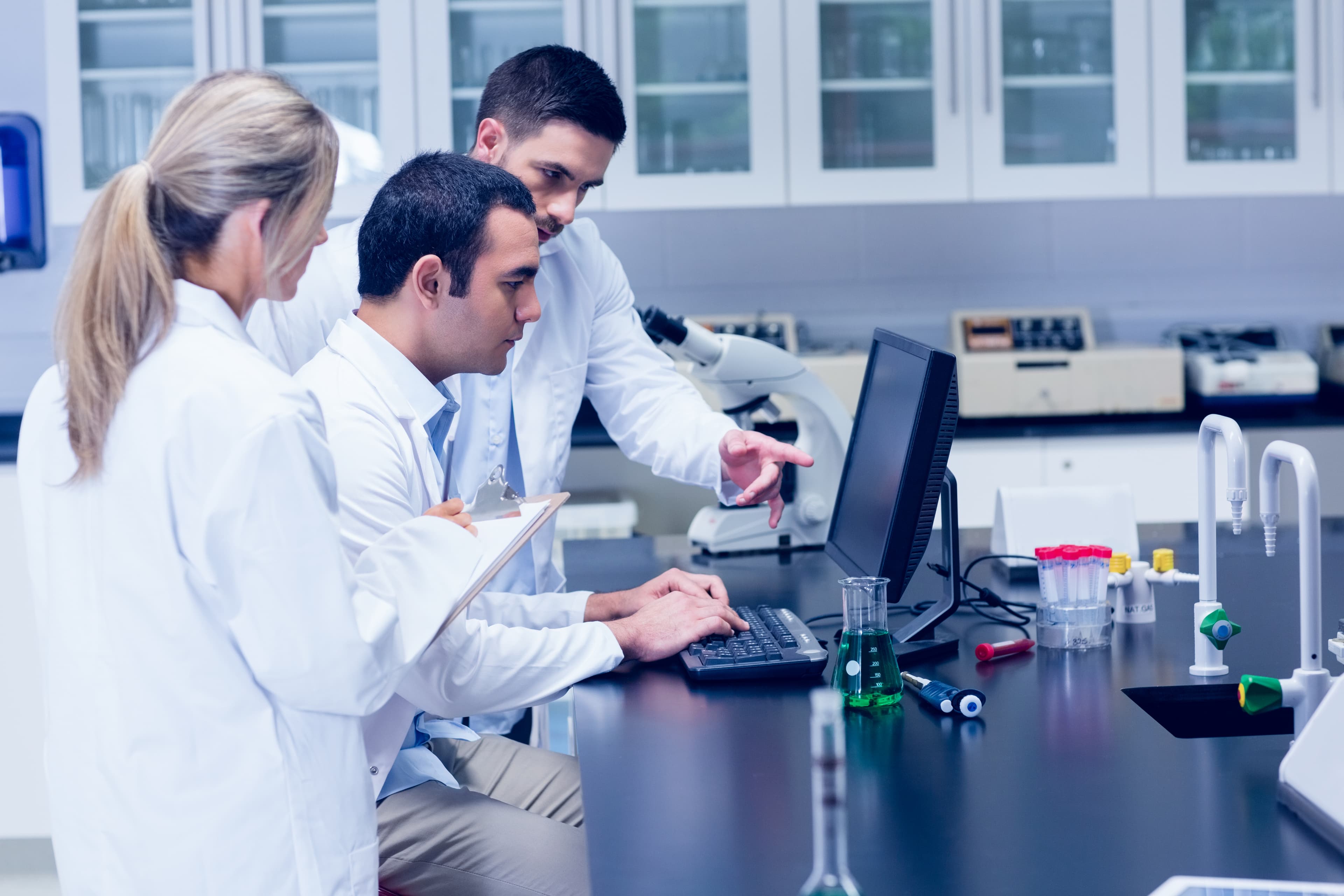 Laboratory team reviewing diagnostic results